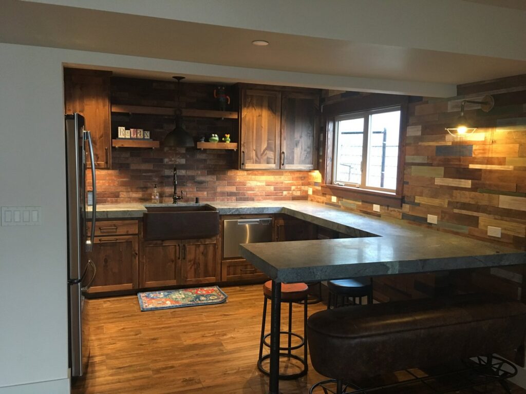A beautifully renovated kitchen and bar area by Gregg Hoffman Construction Inc. in Tacoma, WA