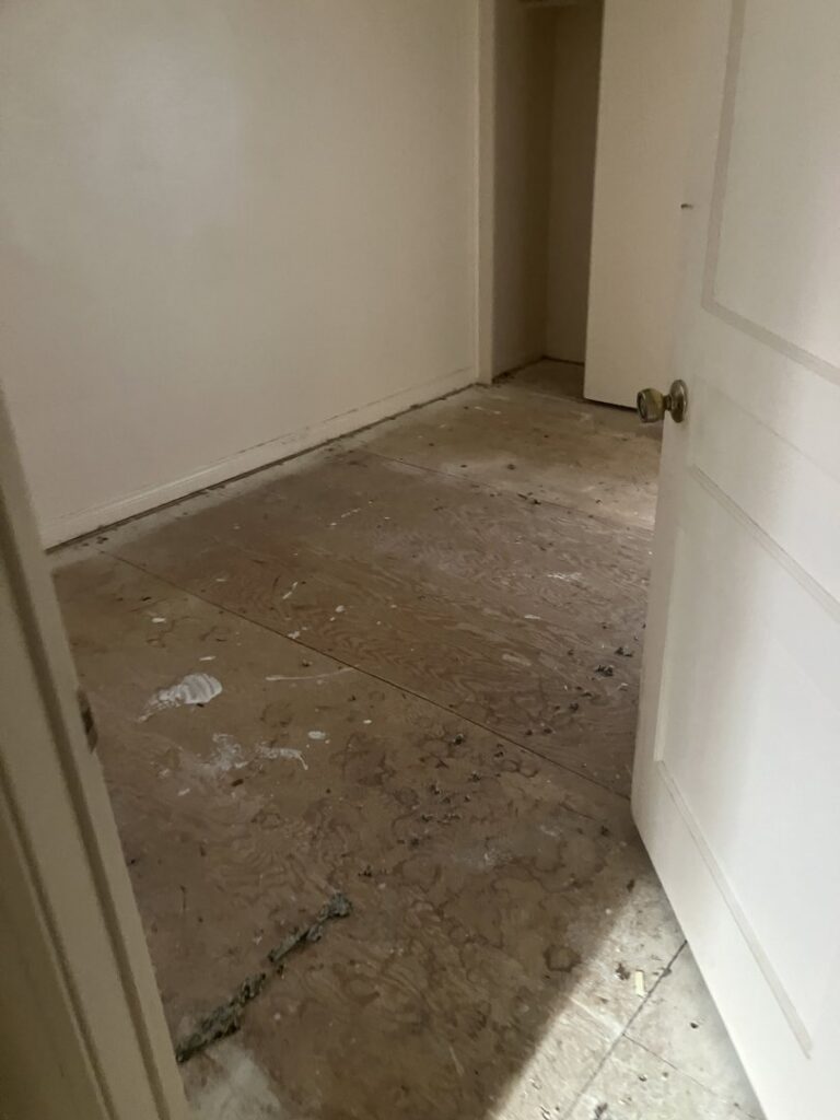 Renovation debris and dirt on an exposed subfloor, ready for cleanup and removal by MGM Household Services in Las Vegas, NV.