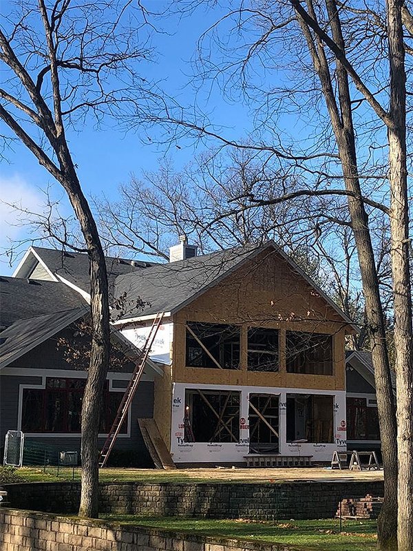 A residential home under construction, showing new framing and sheathing work by Elk Building Services in Toledo, OH.