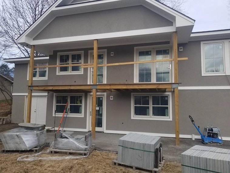 Residential deck building project showing construction materials by Rochester Remodeling and Home Builders in Rochester, NY.
