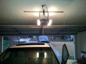 A newly installed residential garage door opener in a home garage by Overhead Door Company of Columbus in Columbus, GA.