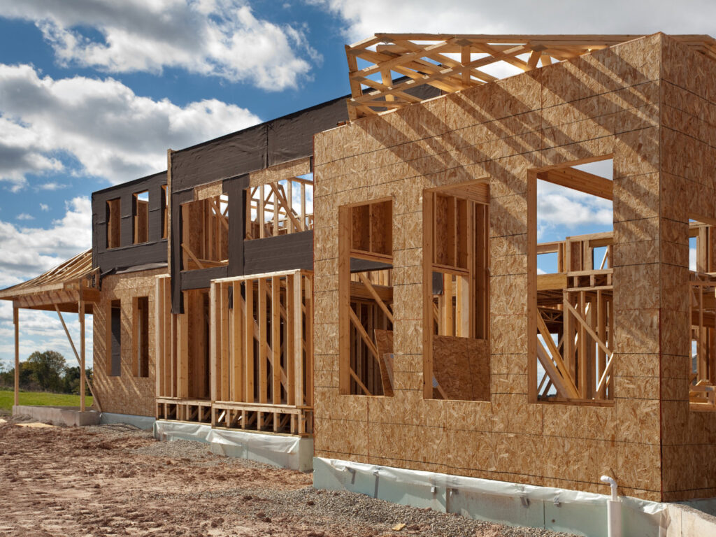 Residential house framing and sheathing under construction by Trident General Contracting in Plano, TX.