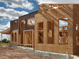 Residential house framing and sheathing under construction by Trident General Contracting in Plano, TX.