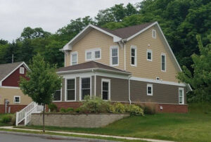 A residential house featuring mixed siding materials, a project by JON Construction, Inc. in Allentown, PA.
