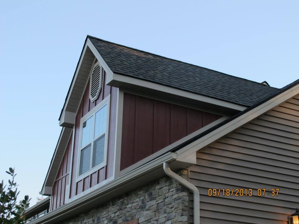 A residential house with new siding and roof, a completed project by JON Construction, Inc. in Allentown, PA.