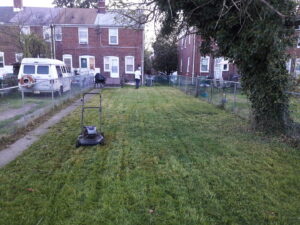 Residential lawn care and landscaping with fresh mulch and a mowed lawn, provided by C&C LAWN CARE,MOVING & TRASH REMOVAL in Baltimore, MD