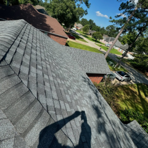 An aerial view of a newly replaced residential roof by Caliber Roofing LLC, serving homes in Meridian, ID.