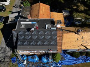 Aerial view of a residential roofing project in progress by Moonshot Roofing in Columbia, PA.