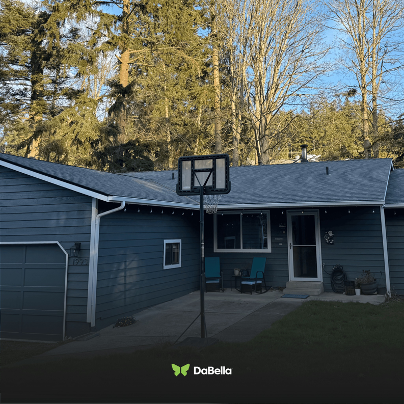 A residential home showcasing new roofing, siding, and gutters expertly installed by DaBella in Minneapolis, MN.