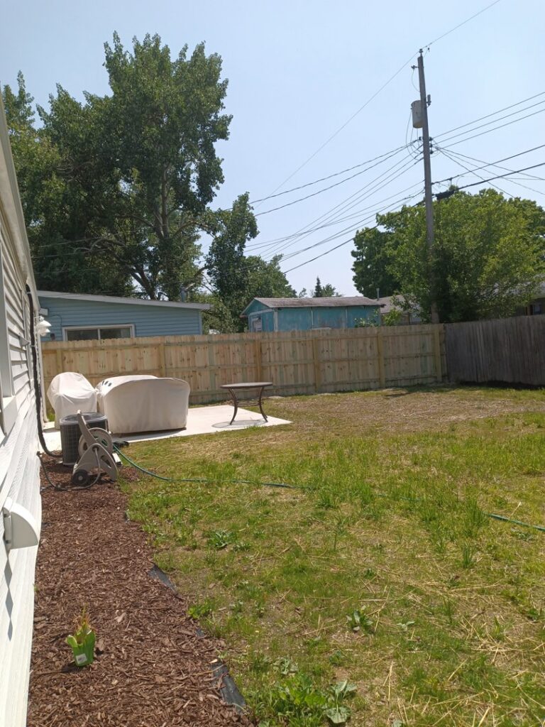 A residential wooden privacy fence recently installed by Ofandiski Fence Co. Inc in Lorain, OH.