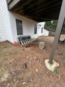 Residential yard debris, including a ladder and metal frames, ready for removal by Eagle Junk Removal in Cloverdale, CA.