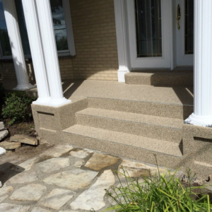 A beautifully resurfaced concrete porch and steps completed by CJD General Contracting, LLC in Kansas City, MO.