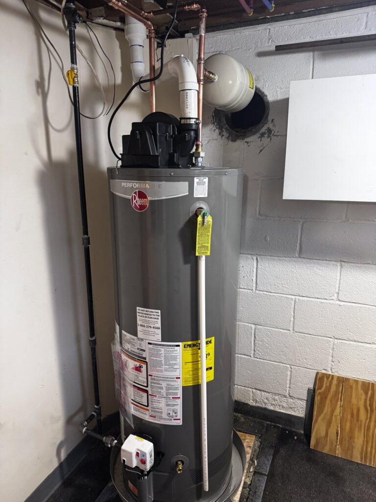 A Rheem Performance water heater installation with new piping by Clear Flow Plumbing, Heating, and Hvac Contractors LLC in Jersey City, NJ
