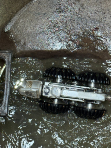 A robotic camera performing a detailed drain and pipe inspection for Utility Inspection Services, Inc. in Knoxville, TN.