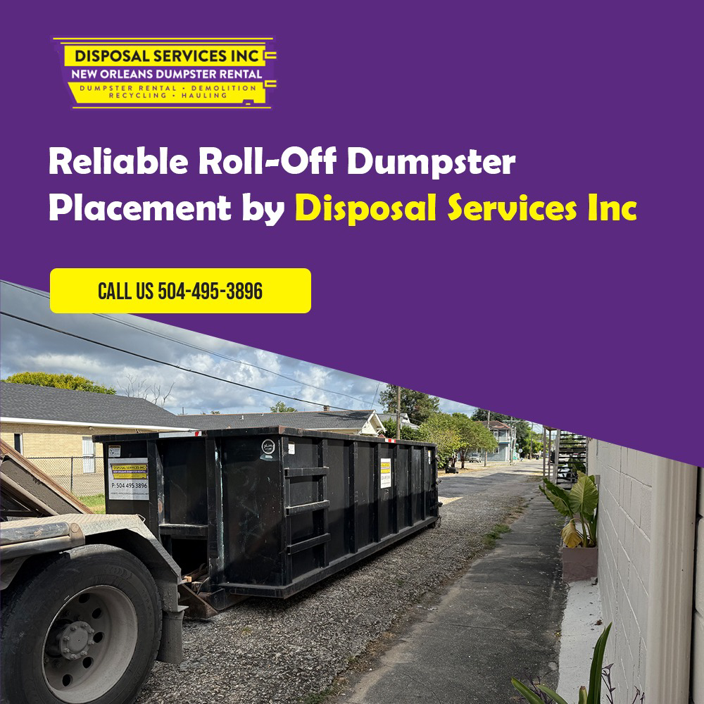 A roll-off dumpster being placed on a residential street by Disposal Services Inc. in New Orleans, LA