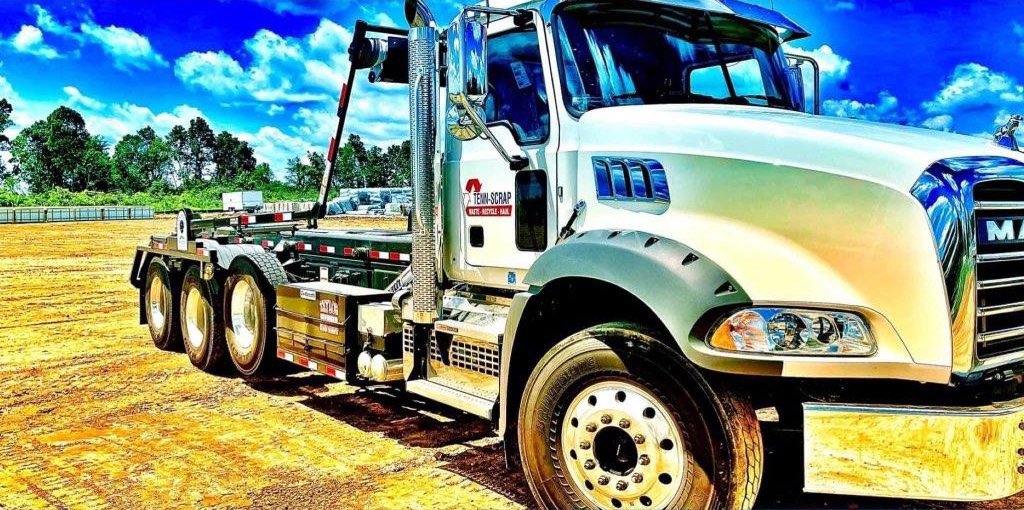 A Tenn-Scrap roll-off truck, part of the junk removal fleet in Jackson, TN.