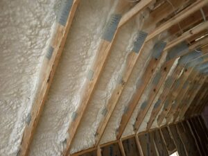 Spray foam insulation applied to a roof deck from a different angle by Insulation By Cohen's in Moncks Corner, SC.