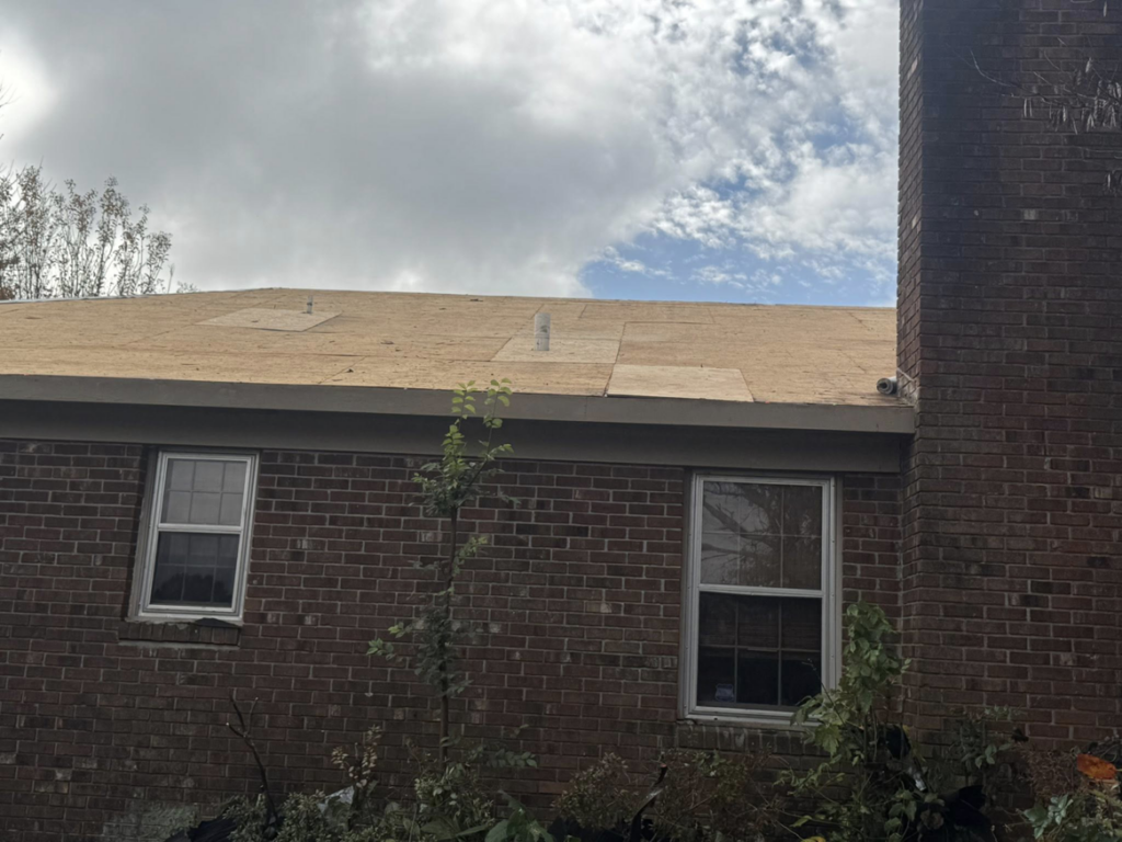 Residential roof decking exposed during a full roof replacement service by Skyline Roofing L.L.C in Jackson, TN.