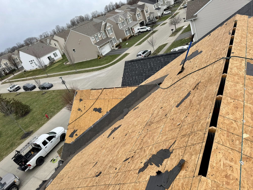 Roof decking exposed for repair or replacement by Darby Builders in Columbus, OH.