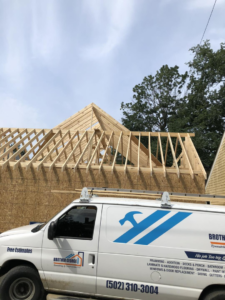 A roof framing construction project underway by Brother George Remodeling & Construction in Louisville, KY.