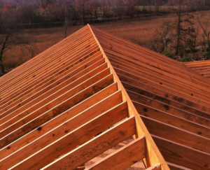 New roof framing under construction, showcasing structural work by F&S Construction Group in Chicago, IL.