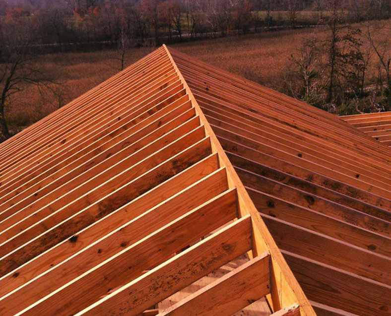 New roof framing under construction, showcasing structural work by F&S Construction Group in Chicago, IL.