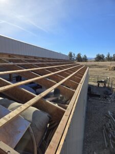Roof framing and truss installation on a building by RC Contracting in Chesterfield, MO.