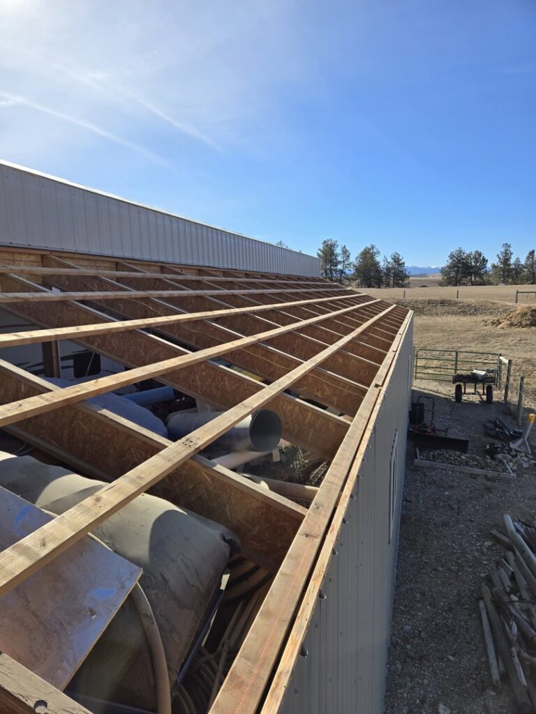 Roof framing and truss installation on a building by RC Contracting in Chesterfield, MO.