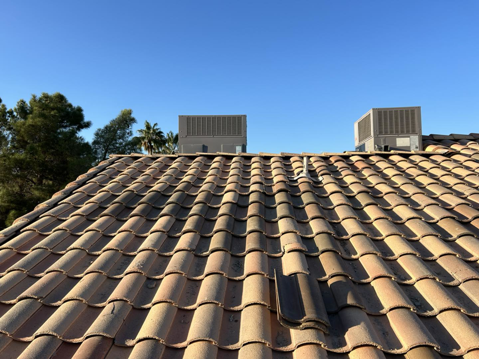 A tiled roof with a displaced tile, indicating a need for repair or inspection by Handyman Service's in North Las Vegas, NV.