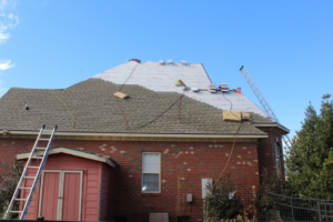 A residential roof replacement project in progress by Advanced Roofing Solutions, LLC in Blountville, TN.