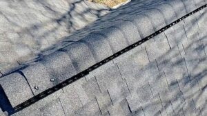 A close-up view of a newly installed roof ridge vent by Artstone Exteriors & Renovations in Myersville, MD.