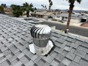 A newly installed roof turbine vent on a shingle roof by Vegas Valley Remodeling/Handy-Man Services in Las Vegas, NV.