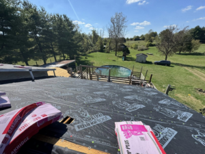 Roof underlayment installed with bundles of Oakridge shingles ready for installation by Conway's Roofing in Richmond, KY.