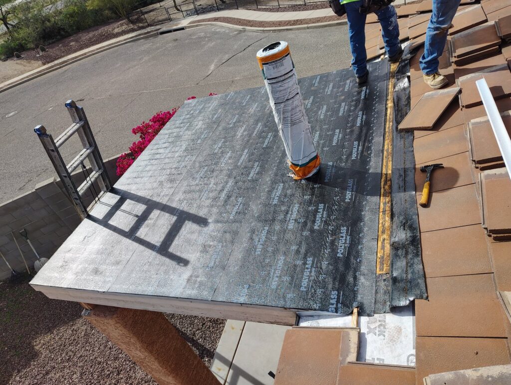 Roof underlayment being installed as part of a roofing project by Mayitos roofing LLC in Tucson, AZ.