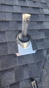 A close-up view of a roof vent pipe with new flashing installed by Elsass Home Services in Idaho Falls, ID.