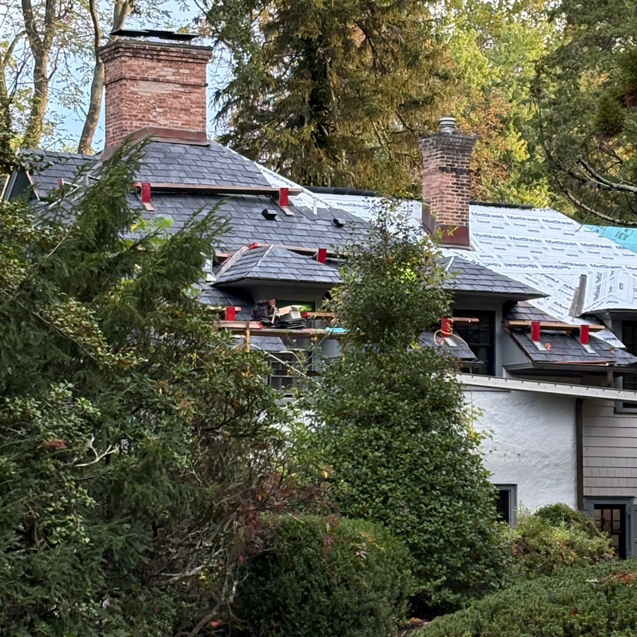 Close-up of new roofing installation during a house renovation by Alloway Construction & Restoration Inc in Skillman, NJ