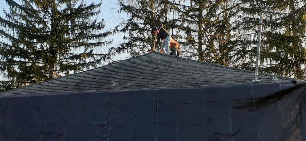 Roofing installation in progress on a residential home by Manny's Sb Construction Inc in Goshen, NY.