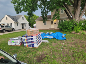 Roofing and siding construction materials delivered to a job site by INT-X Remodeling LLC in Woodbury, MN.