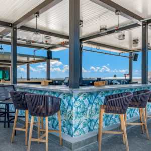 A stylish rooftop bar area, a completed commercial project by LEMA Construction, Inc. in Saint Petersburg, FL.