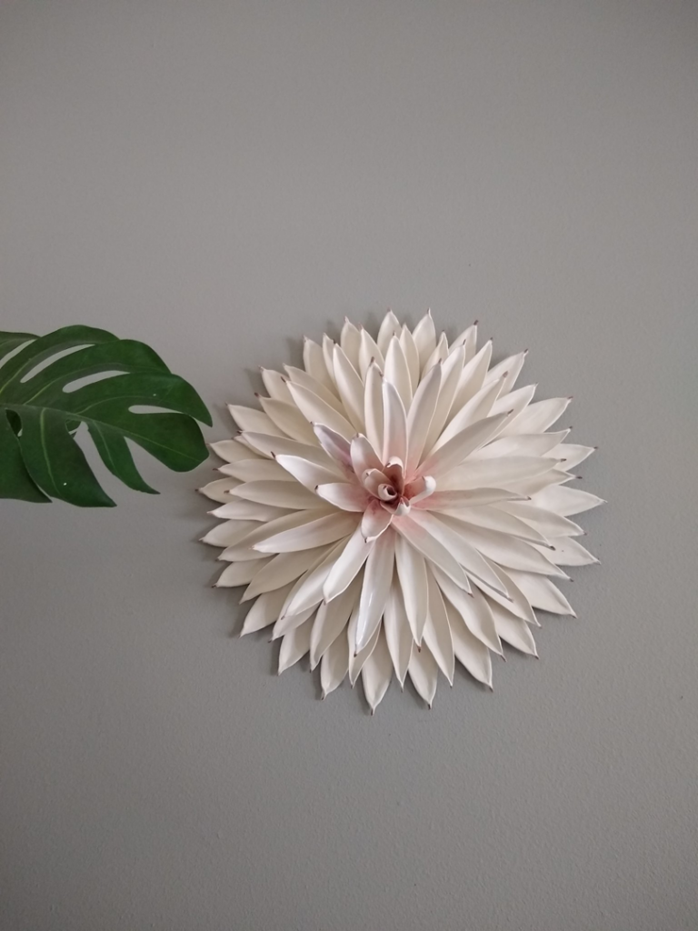 A room featuring decorative polka dot painting and a chandelier installation, services provided by Sharper Edge Painting in Everett, WA.