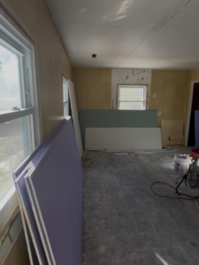 A room undergoing drywall installation and renovation by The Handyman Gabriel in Madison, WI