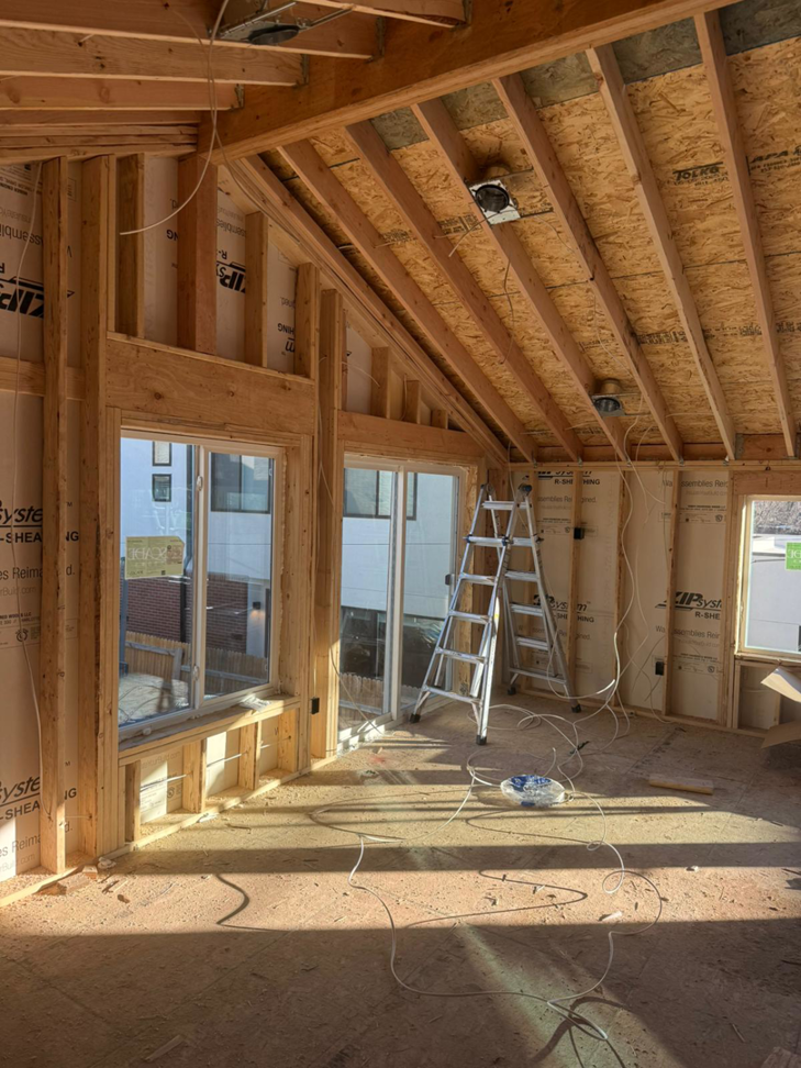 Room framing with new windows and electrical wiring by Alex Home Pro Colorado in Denver, CO