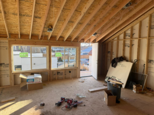 Room framing and window installation during a renovation by Alex Home Pro Colorado in Denver, CO