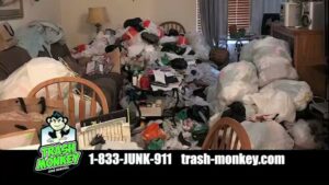 A cluttered room overflowing with bags of trash and miscellaneous items, representing a major cleanout job for Trash Monkey Junk Removal in Charleston, WV.