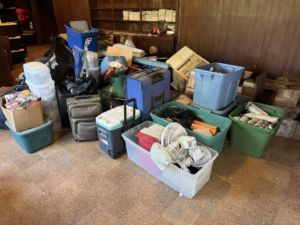 A room filled with various items and clutter ready for junk removal by Quick Lift Junk Removal in Hagerstown, MD.