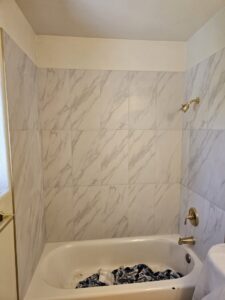 A multi-panel view of a room renovation, including new flooring, paint, and recessed lighting by VDO. Remodeling in Rancho Cordova, CA.