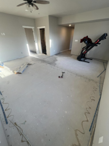 A room with subfloor prepared for new flooring installation by Elite Flooring Professionals in Pueblo, CO.