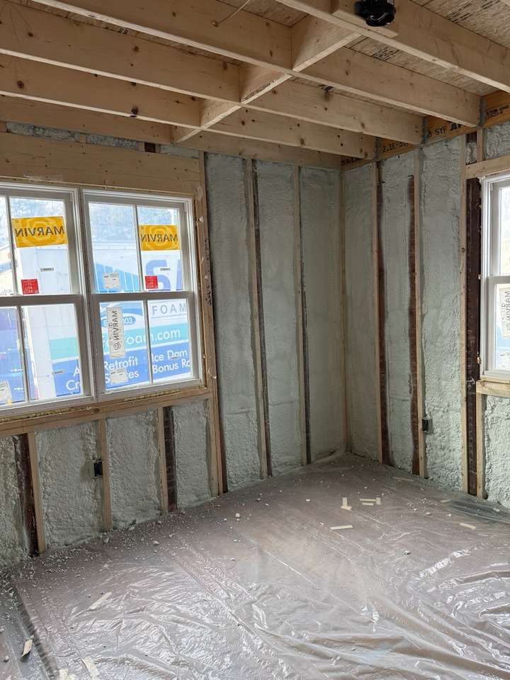 Interior room walls with spray foam insulation applied during construction by Safco Foam Insulation in Hampden, MA.