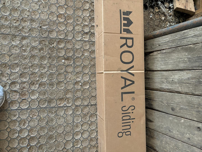 A box of Royal Siding materials for handyman services by E.L.Y Siding Company in Buckner, MO