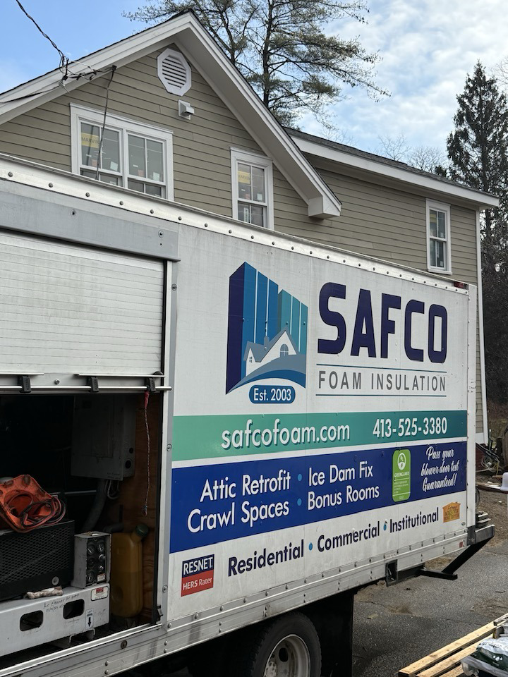 Safco Foam Insulation service truck parked outside a residential home in Hampden, MA, ready for a job.